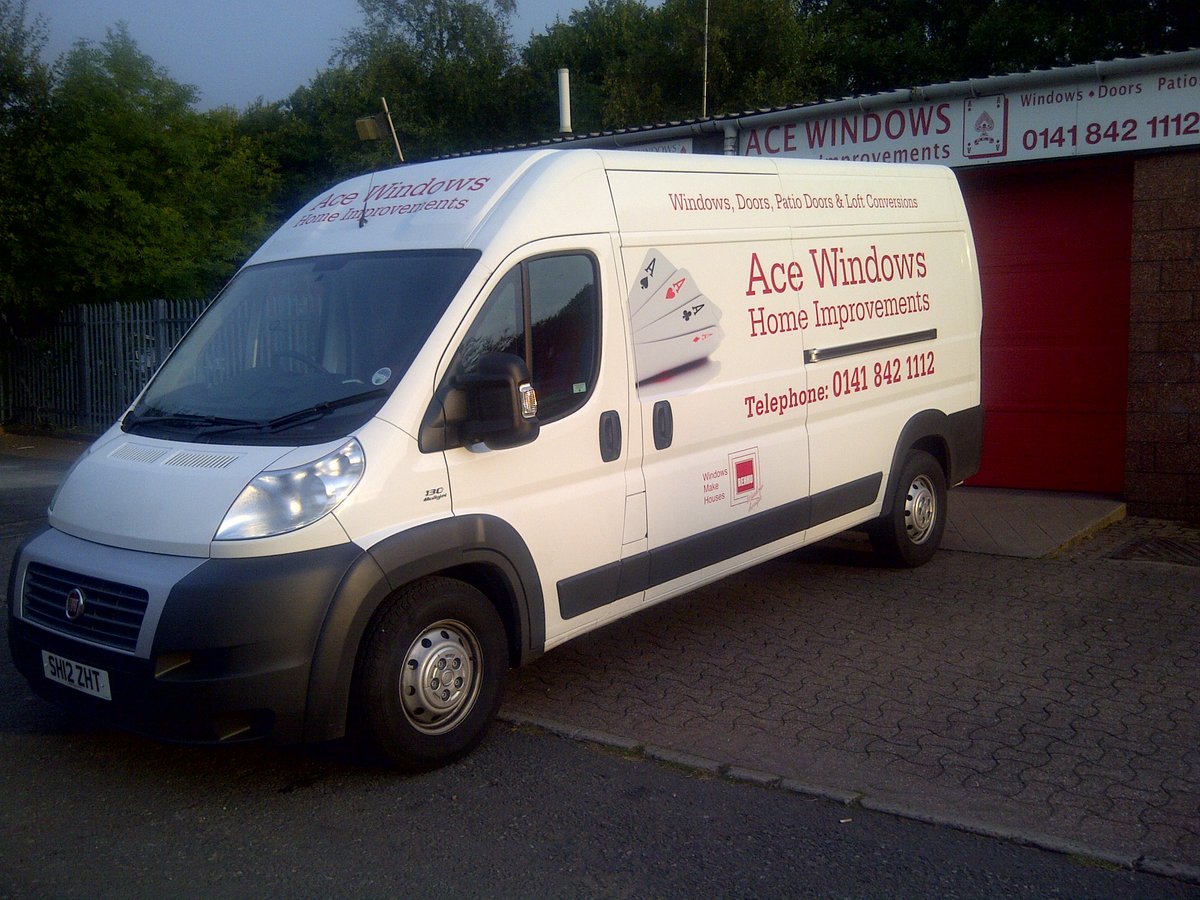 Ace Windows signwritten van outside a workshop.